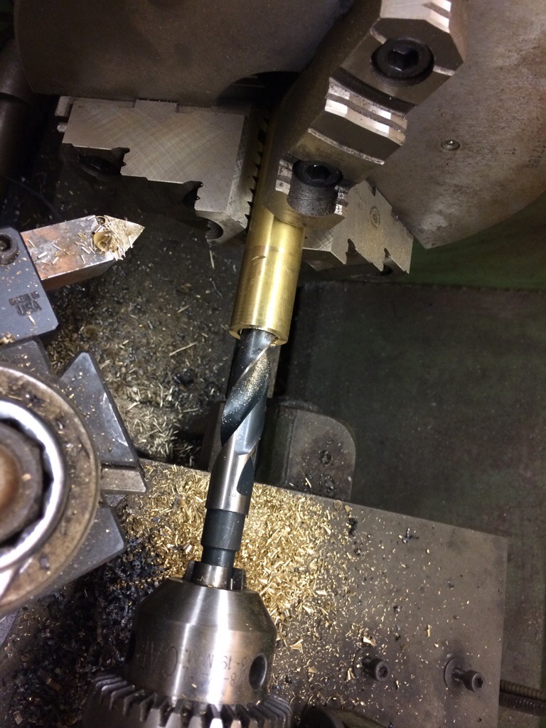 Bronze stock being drilled out to accept the new shaft