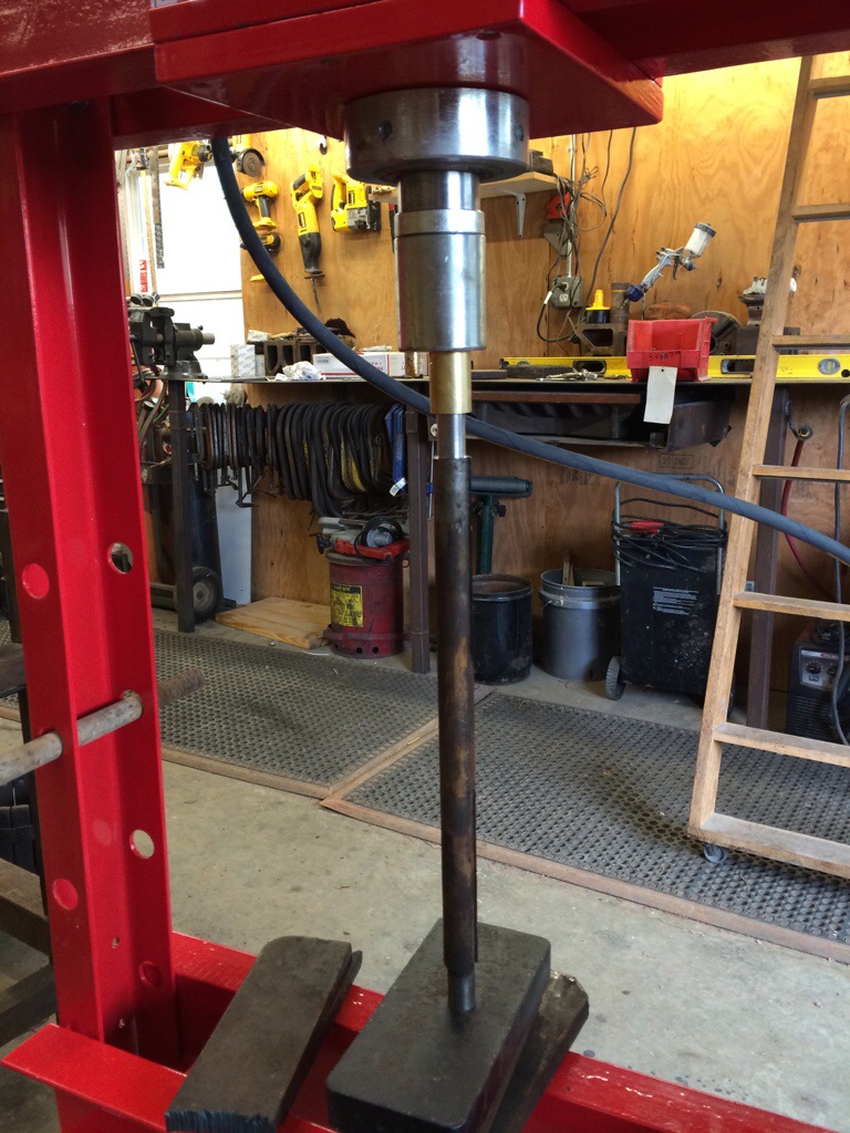 Pressing the bushing onto the steel shaft. A perfect fit.