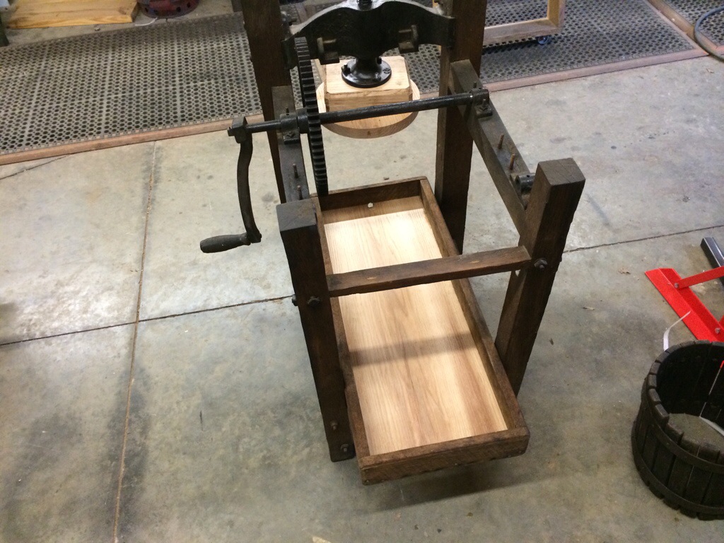 A rebuilt drip tray with one piece new bottom