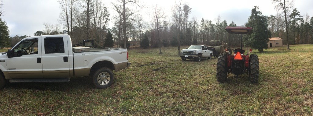 Stuck truck pulling hay