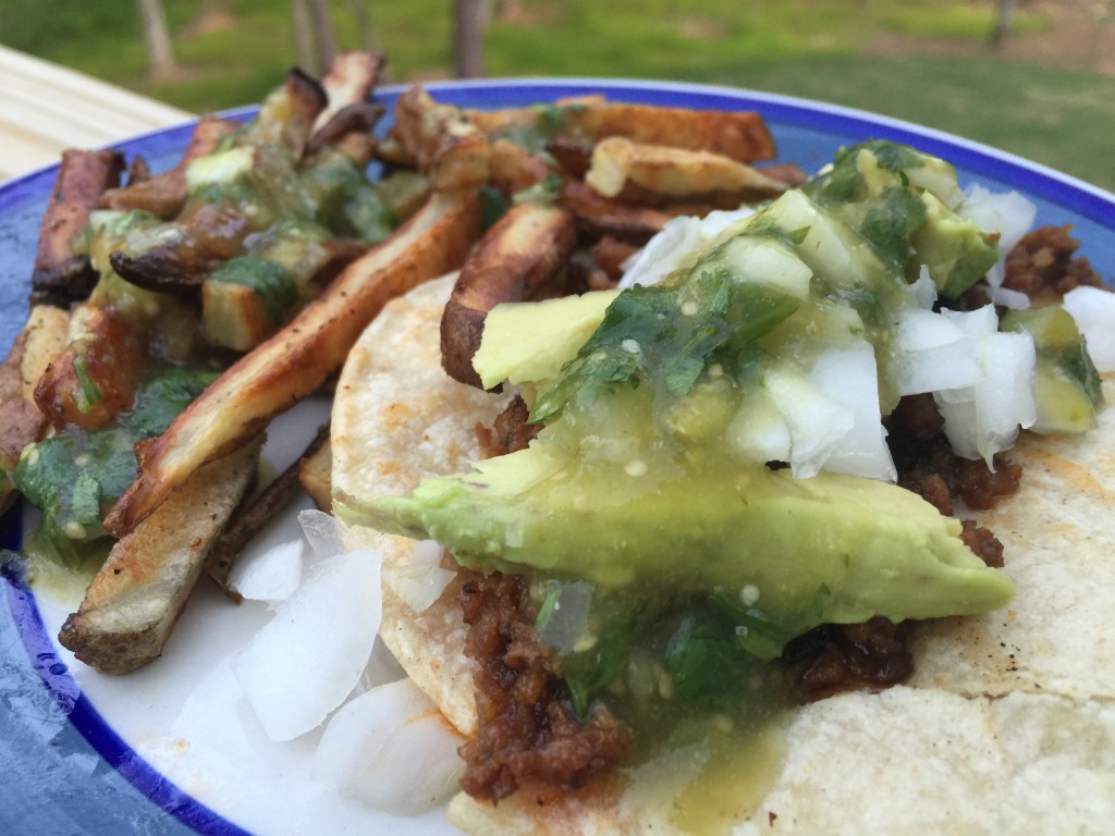 Chorizo tacos with home made salsa and fries.