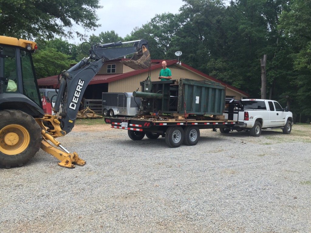 Large cardboard baler on trailer