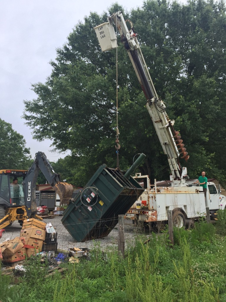 Placing a baler into position.