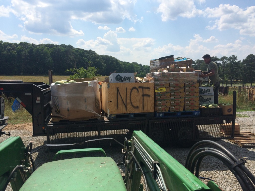 Produce being offloaded from a trailer