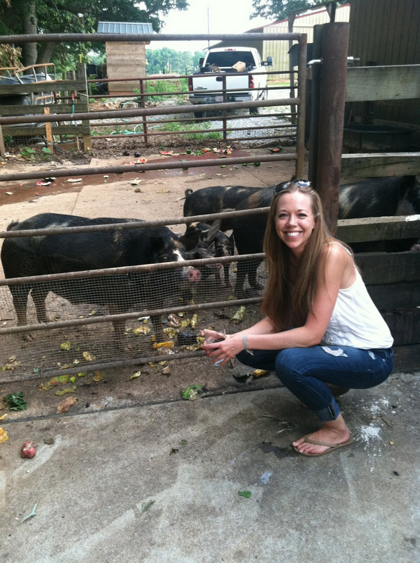 Laura in front of the pigs