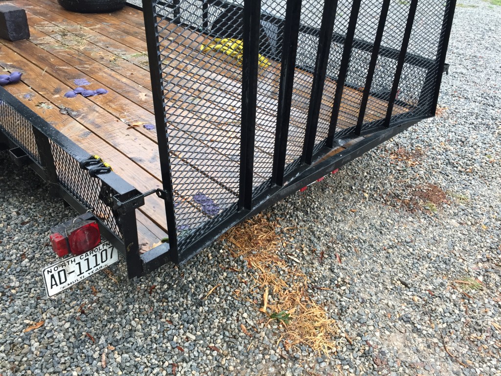 Damaged gate on trailer from accident