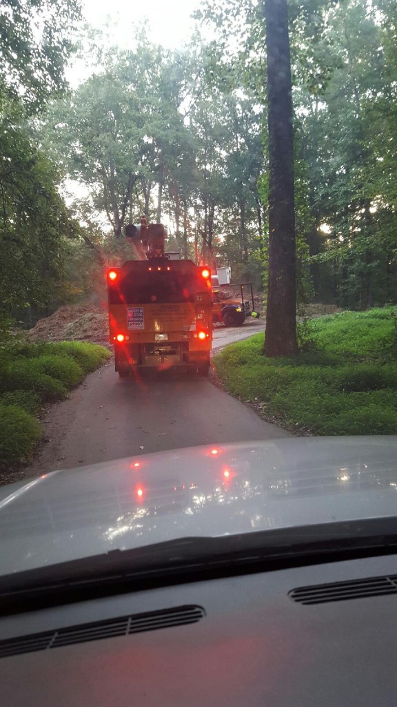 Chip truck unloading at the farm