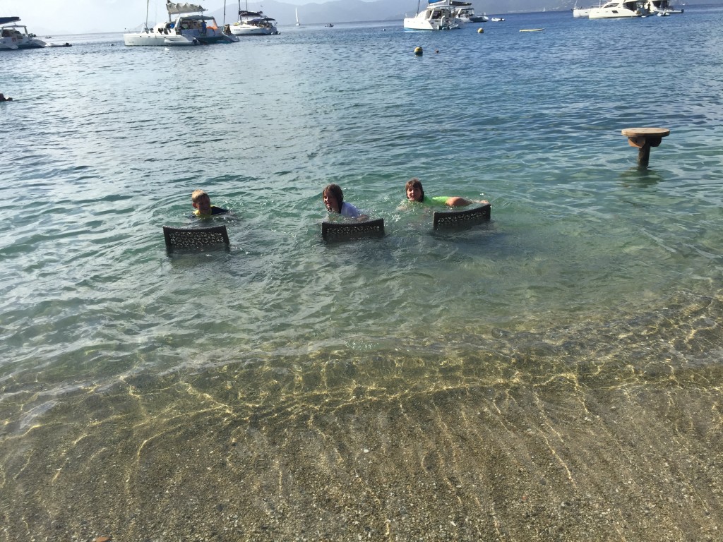 Kids playing on chairs in the BVIs. Cooper Island