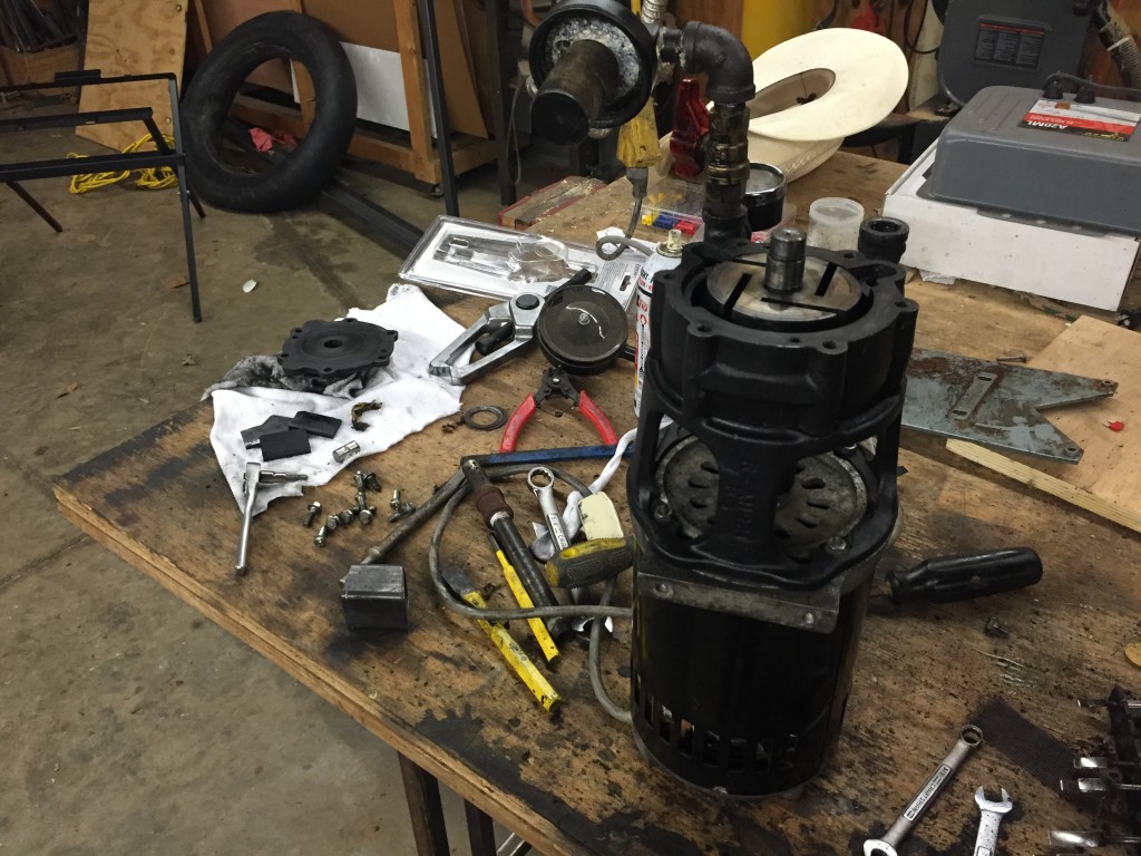 Rotary vane milker vacuum pump partially disassembled