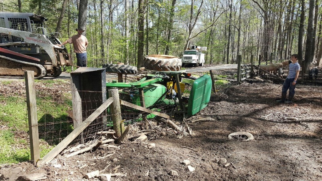 Tractor turned over and in a ditch