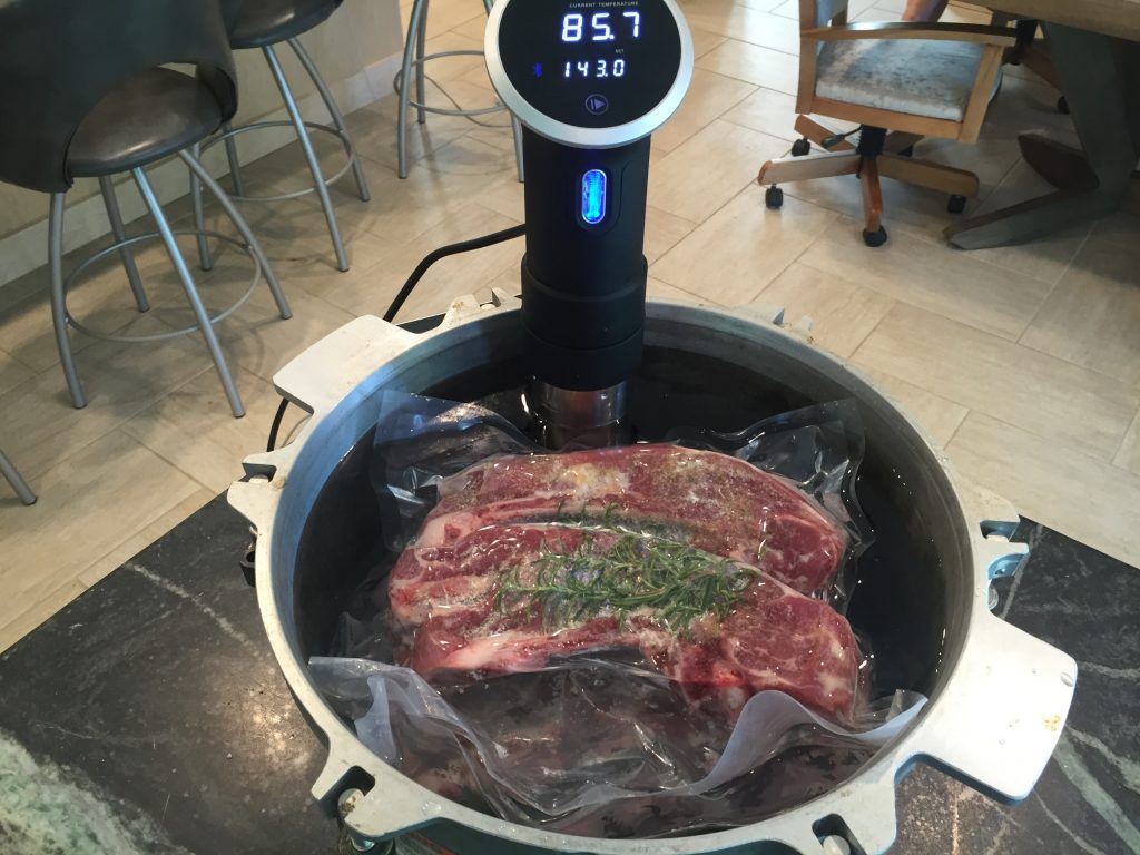 Frozen lamb shoulders just starting in the meat aquarium