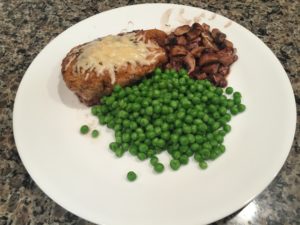 Chicken marsala, mushrooms, and peas. 