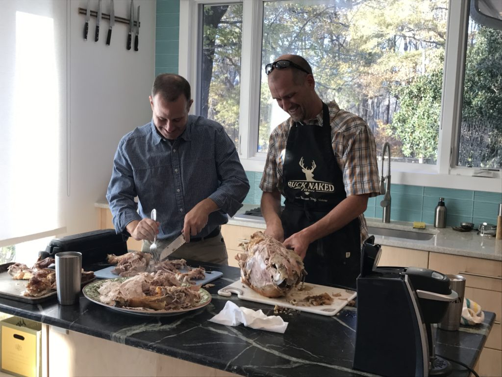 Dave and Dan carving the turkey