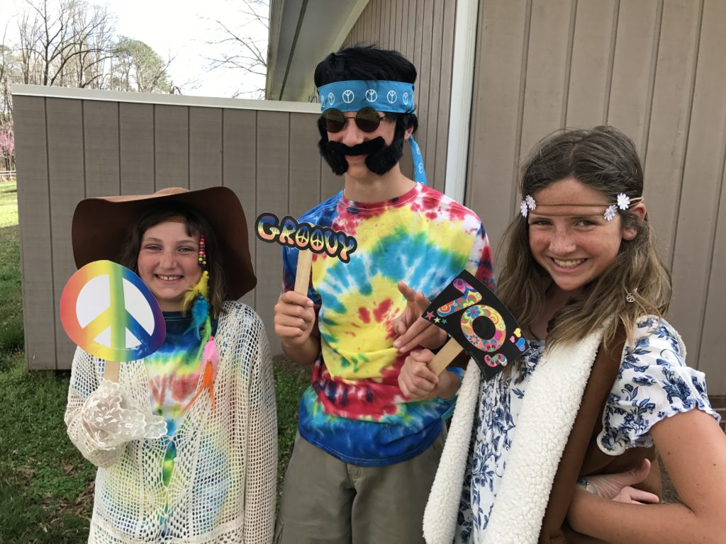 Kids dressed up as hippies