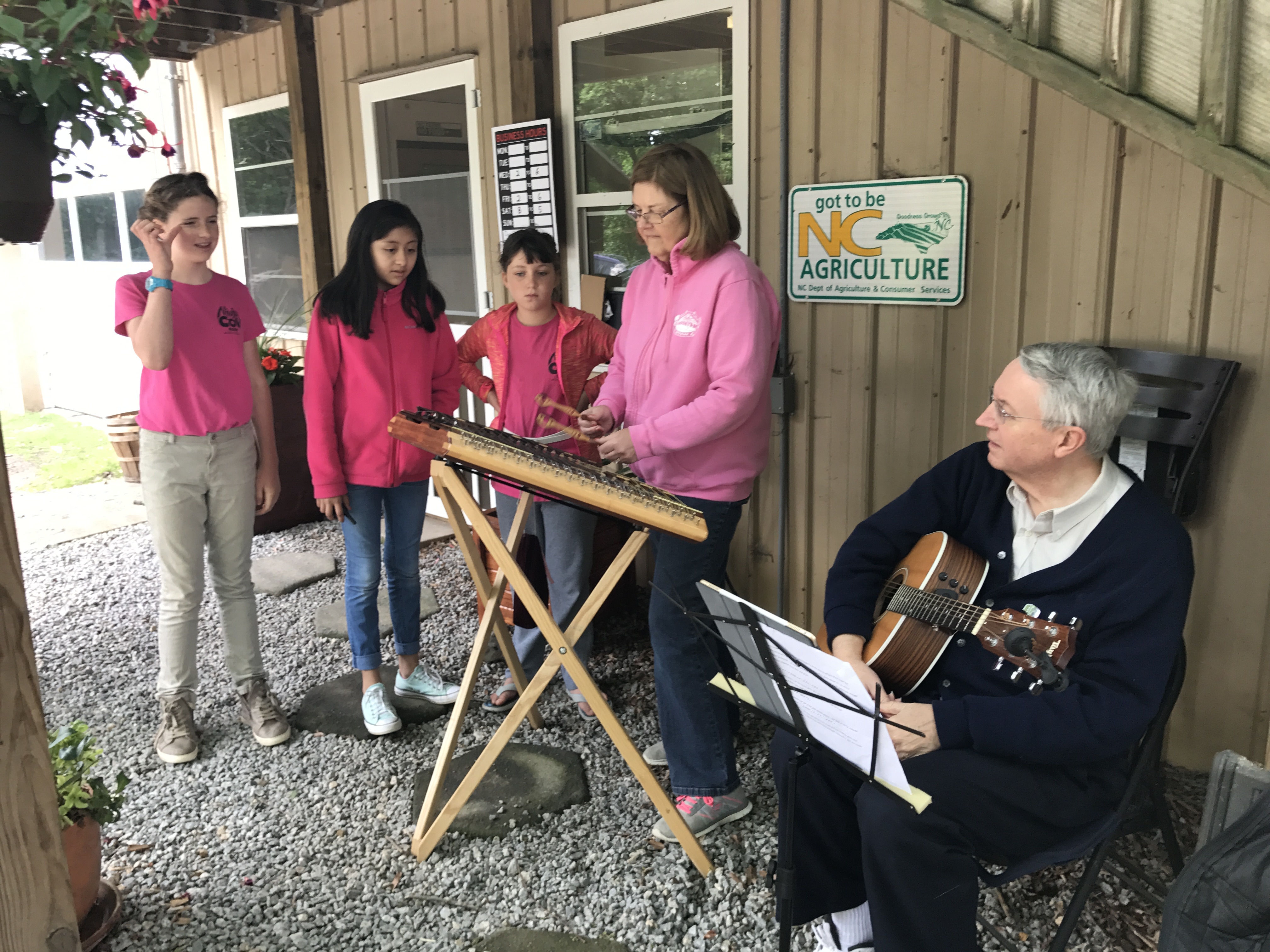 Rosemary playing music at open barn day