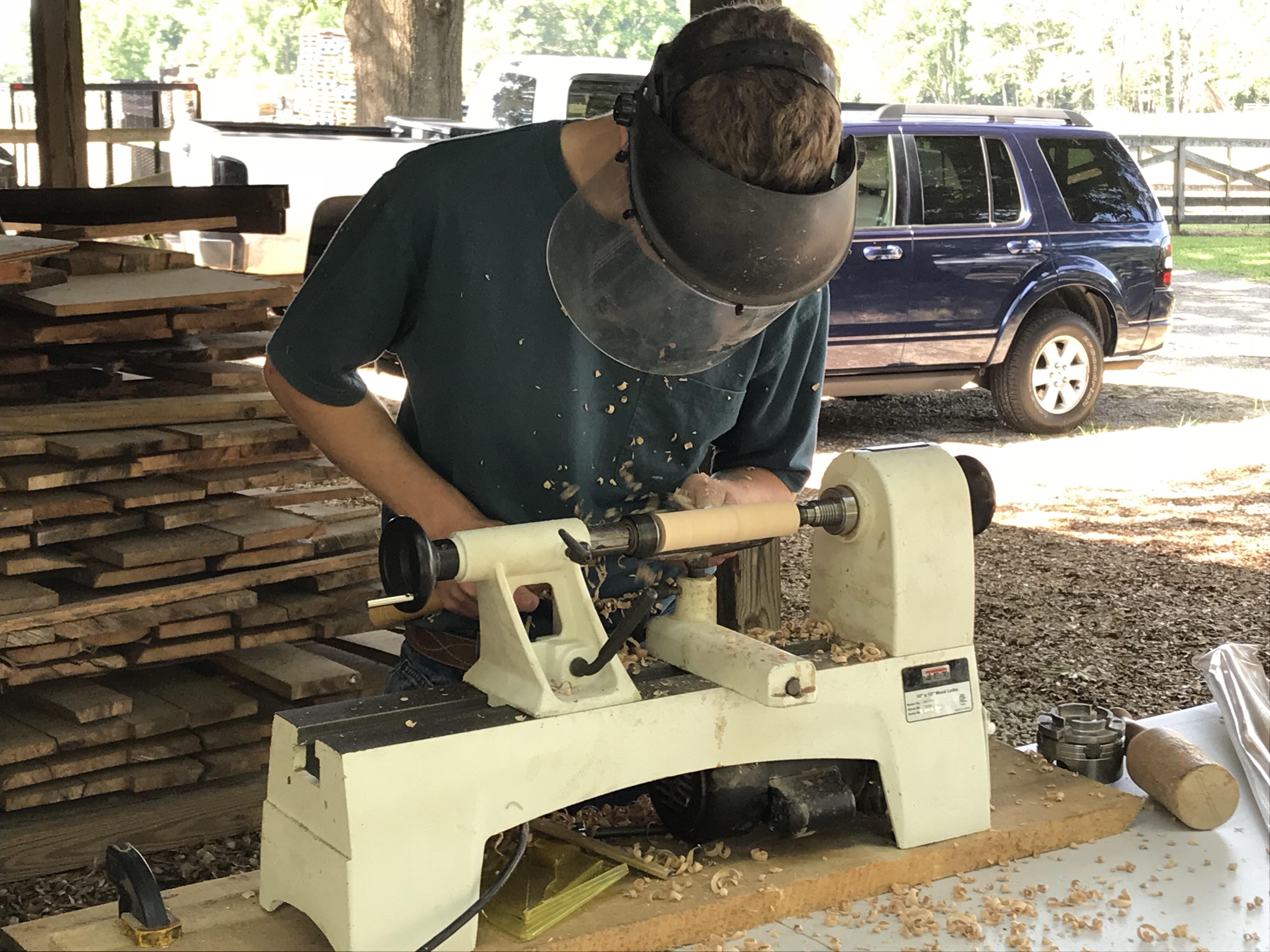 Aaron from Buck Naked Farm doing a lathe demonstration