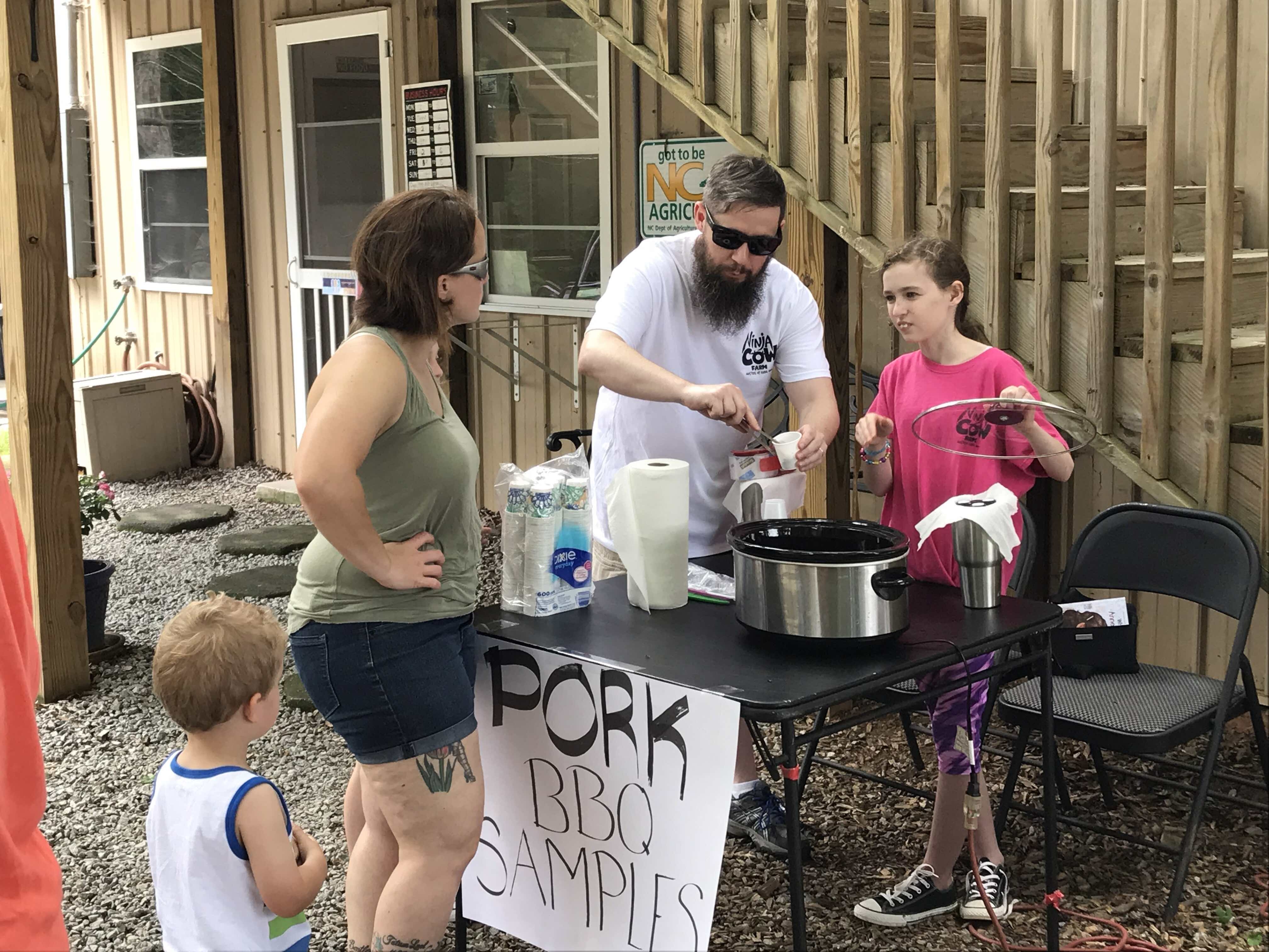 Jason and Ru handing out samples