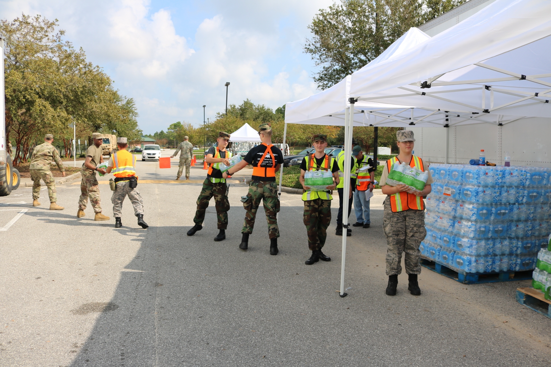 Cadets and national guard moving water