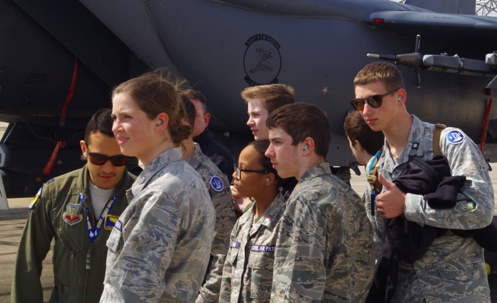 The kids listening to the pilots talk on the ramp at Seymour