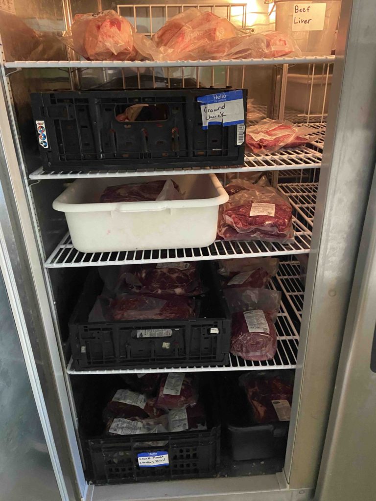 Beef freezer half full of beef