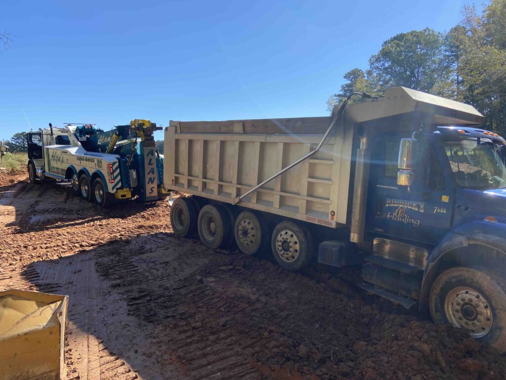 Truck being towed after breaking down